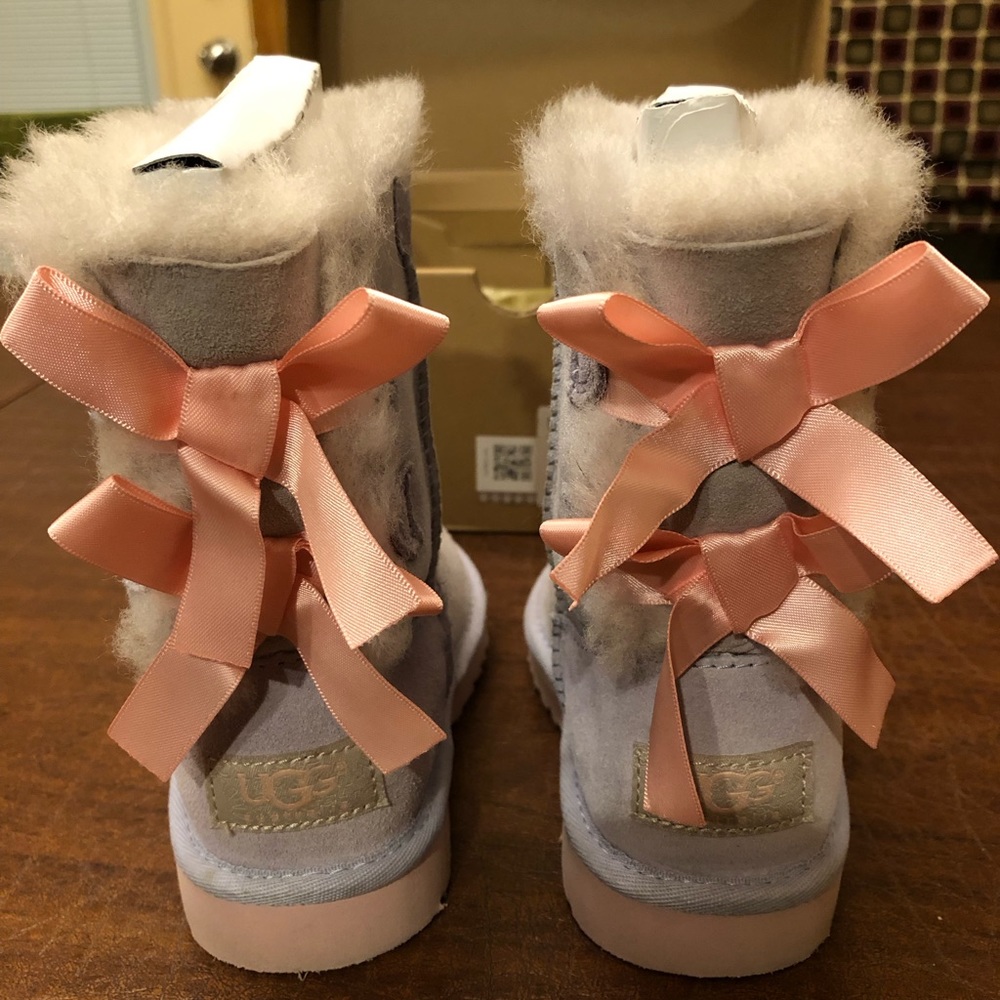 UGG T Bailey Bow Boots Girls Size 10, Violet Boots with Pink Soles and Bows.